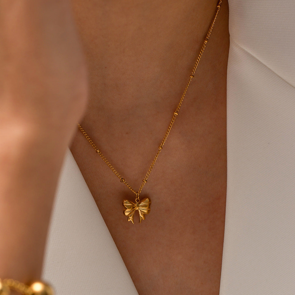 Collier pendentif papillon en acier inoxydable doré 18 carats, exquis et léger