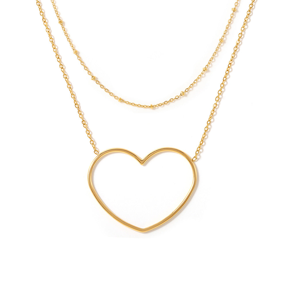 Collier européen et américain à double clavicule creuse en acier inoxydable plaqué or 18 carats
