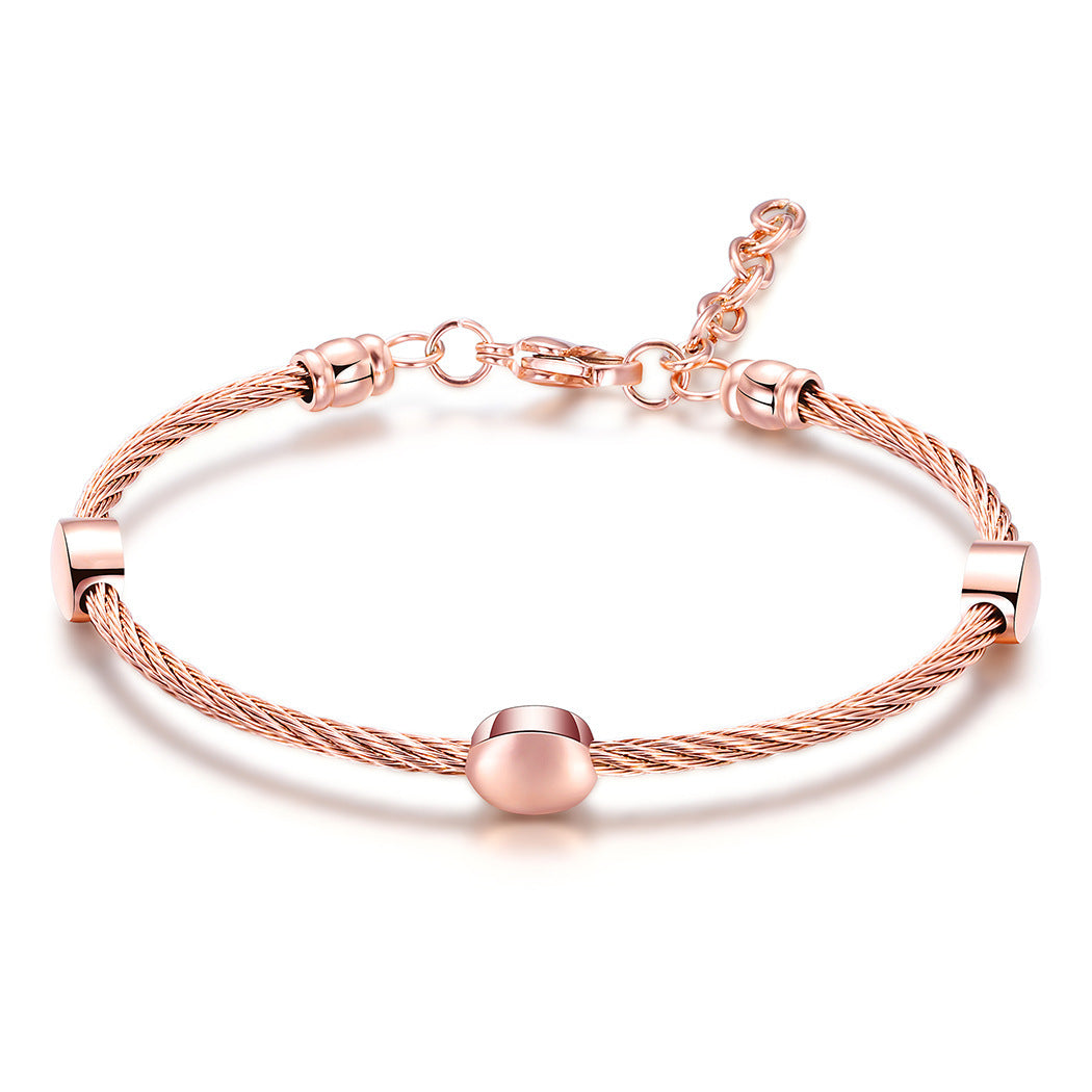 Bracelet en acier titane quatre couleurs, bracelet en fil d'acier inoxydable avec perles