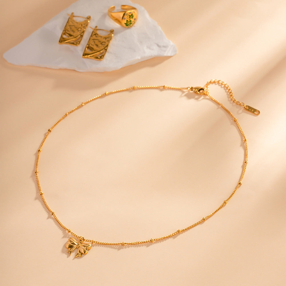 Collier pendentif papillon en acier inoxydable doré 18 carats, exquis et léger