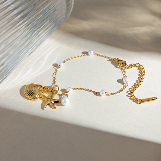 Bracelet tendance avec pendentif en forme d'étoile de mer et coquillage, chaîne en acier inoxydable et or 18 carats, idéal pour les vacances d'été