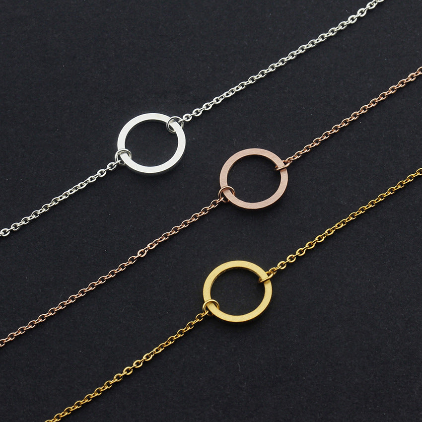 Bracelet simple et rond en acier inoxydable avec anneau de vie minimaliste