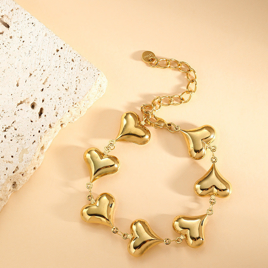 Bracelet coeur et coquillage en acier inoxydable