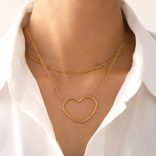 Collier européen et américain à double clavicule creuse en acier inoxydable plaqué or 18 carats